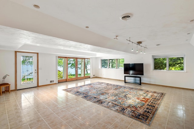 15665 Portage Rd, Vicksburg, MI 49097 - living area with healthy amount of natural light and tile patterned flooring