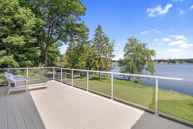 15665 Portage Rd, Vicksburg, MI 49097 - deck featuring a water view and a yard