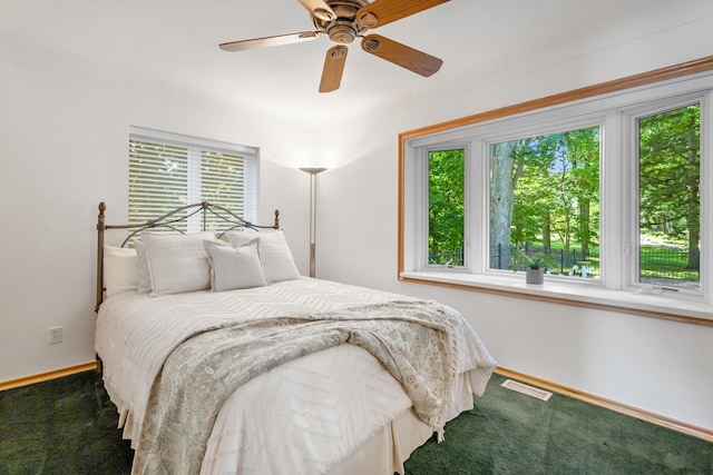 15665 Portage Rd, Vicksburg, MI 49097 - carpeted bedroom with baseboards and ceiling fan