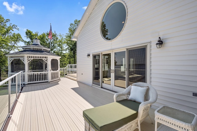 15665 Portage Rd, Vicksburg, MI 49097 - wooden deck with french doors and a gazebo