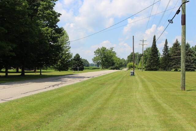 2786 Dinius Rd, Tecumseh, MI 49286 - view of asphalt street with view of wooded area