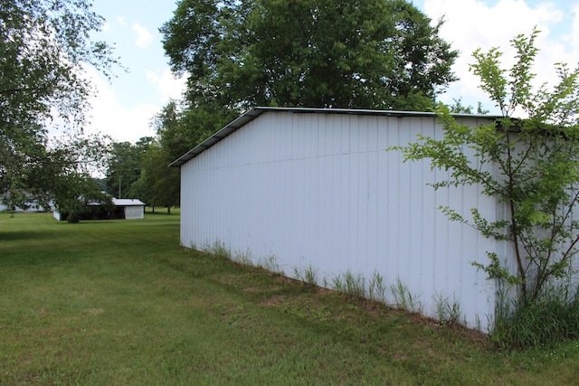 2786 Dinius Rd, Tecumseh, MI 49286 - view of side of home featuring a yard