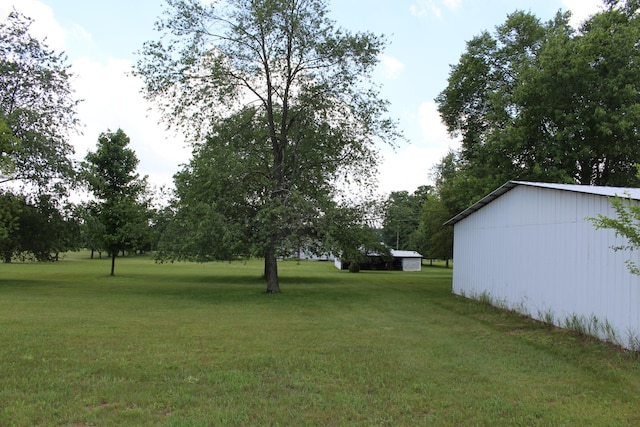 2786 Dinius Rd, Tecumseh, MI 49286 - view of green lawn with an outbuilding