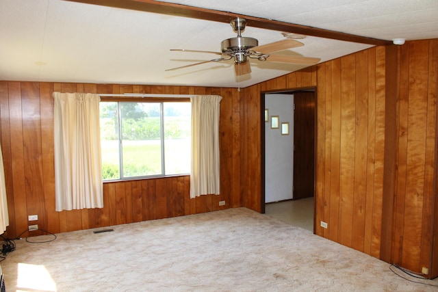 2786 Dinius Rd, Tecumseh, MI 49286 - carpeted spare room with wooden walls, a ceiling fan, and a smoke detector