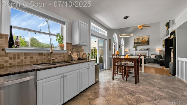 3230 Lynhurst Ct, Rochester, MI 48306 - kitchen with dishwasher, tasteful backsplash, white cabinetry, and dark stone countertops