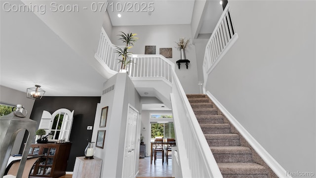 3230 Lynhurst Ct, Rochester, MI 48306 - stairs with a high ceiling and arched walkways
