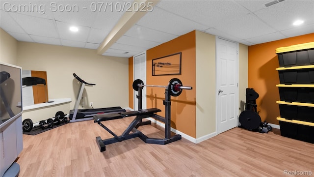 3230 Lynhurst Ct, Rochester, MI 48306 - workout room featuring a drop ceiling, wood finished floors, and recessed lighting