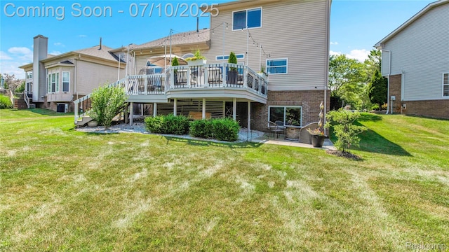 3230 Lynhurst Ct, Rochester, MI 48306 - back of house featuring a wooden deck, a lawn, a patio, and brick siding