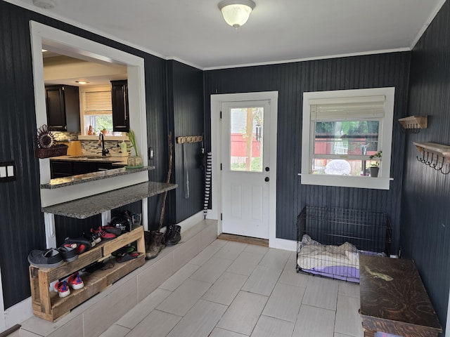 3330 Bradford St NE, Grand Rapids, MI 49525 - mudroom featuring crown molding and a sink