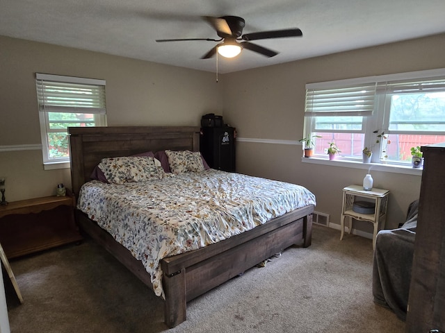 3330 Bradford St NE, Grand Rapids, MI 49525 - bedroom featuring carpet and ceiling fan