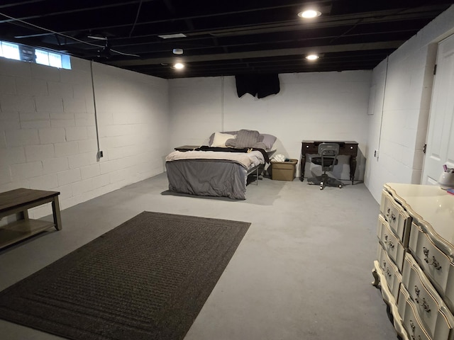 3330 Bradford St NE, Grand Rapids, MI 49525 - bedroom featuring concrete floors and concrete block wall