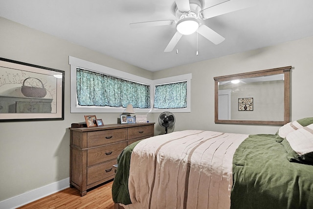 11560 Thrush Dr, Lakeview, MI 48850 - bedroom featuring light wood-style floors and ceiling fan