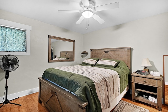 11560 Thrush Dr, Lakeview, MI 48850 - bedroom with wood finished floors and a ceiling fan
