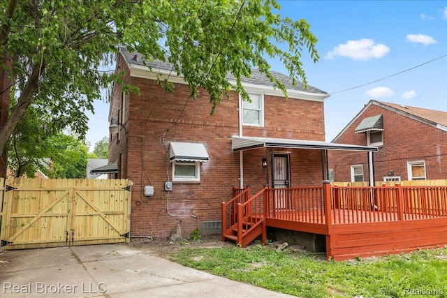 10320 Roxbury St, Detroit, MI 48224 - rear view of house featuring a gate and brick siding