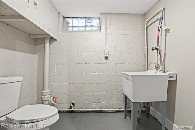 10320 Roxbury St, Detroit, MI 48224 - half bathroom featuring toilet and finished concrete flooring