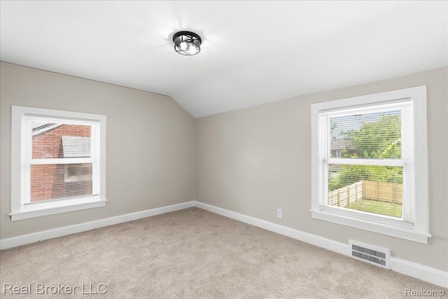 10320 Roxbury St, Detroit, MI 48224 - additional living space with light carpet and lofted ceiling