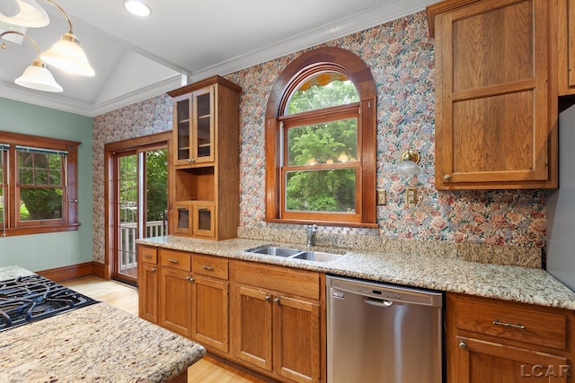 305 W Chicago Blvd, Tecumseh, MI 49286 - kitchen with dishwasher, light wood finished floors, wallpapered walls, black gas stovetop, and ornamental molding