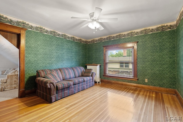 305 W Chicago Blvd, Tecumseh, MI 49286 - living area featuring hardwood / wood-style flooring, a ceiling fan, and wallpapered walls