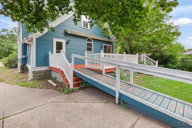 305 W Chicago Blvd, Tecumseh, MI 49286 - view of front of home featuring a wooden deck