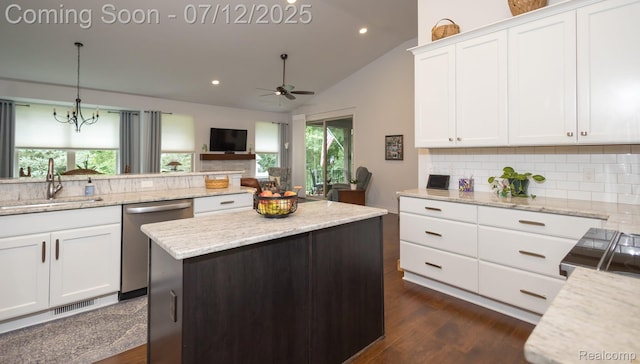 1079 Hampshire Ct, Rochester, MI 48307 - kitchen featuring stainless steel dishwasher, backsplash, dark wood-style floors, a ceiling fan, and white cabinetry