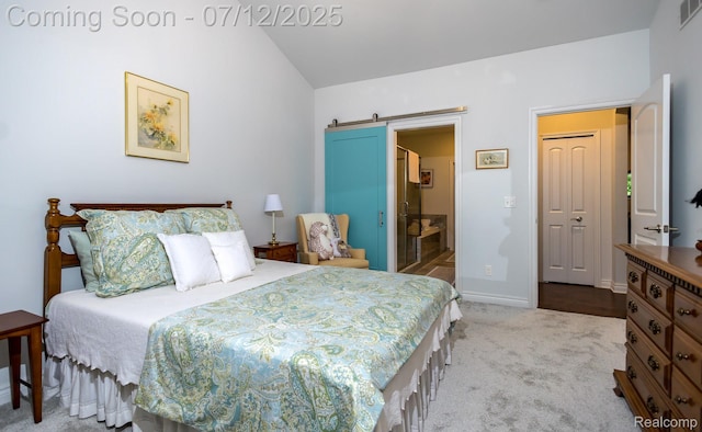 1079 Hampshire Ct, Rochester, MI 48307 - carpeted bedroom with a barn door, lofted ceiling, and ensuite bathroom