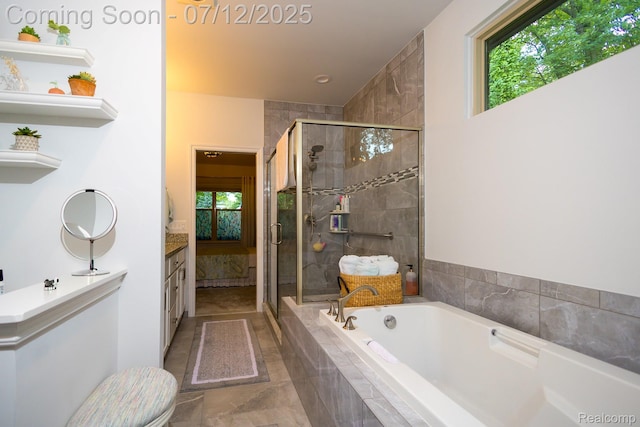 1079 Hampshire Ct, Rochester, MI 48307 - bathroom with vanity, a bath, and a stall shower