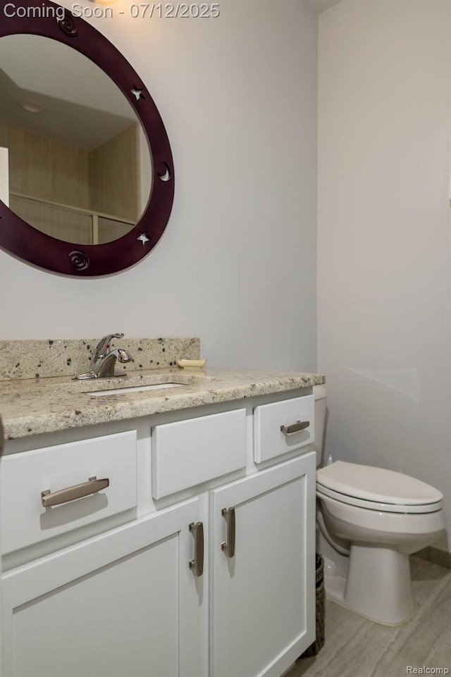 1079 Hampshire Ct, Rochester, MI 48307 - bathroom with vanity and wood finished floors