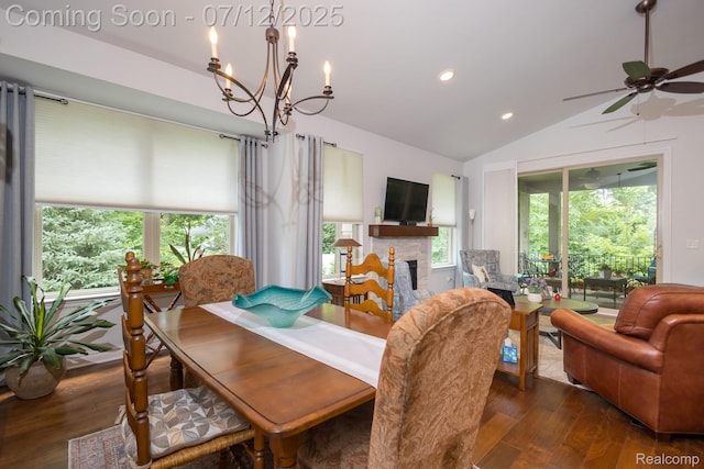 1079 Hampshire Ct, Rochester, MI 48307 - dining space featuring a chandelier, lofted ceiling, wood finished floors, recessed lighting, and a stone fireplace