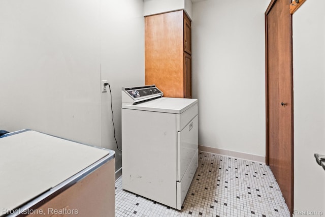 37746 Juniper Dr, Sterling Heights, MI 48310 - laundry area featuring cabinet space, washing machine and clothes dryer, and light tile patterned flooring