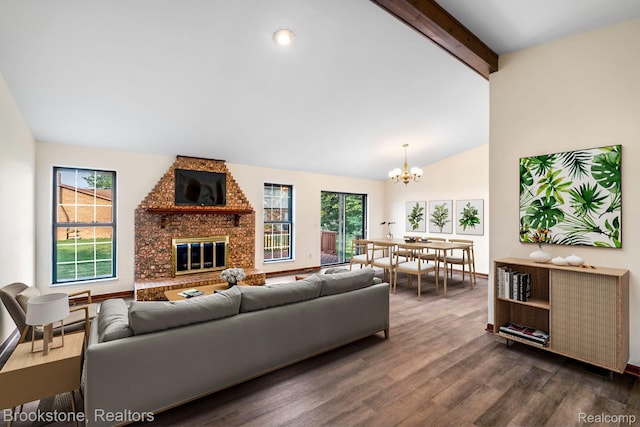 37746 Juniper Dr, Sterling Heights, MI 48310 - living room with a chandelier, dark wood-style flooring, and a fireplace