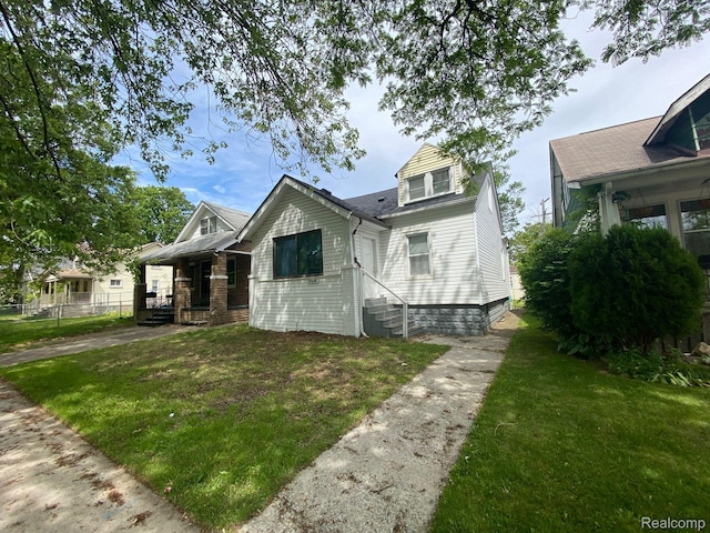 14646 San Juan Dr, Detroit, MI 48238 - bungalow-style home featuring a porch
