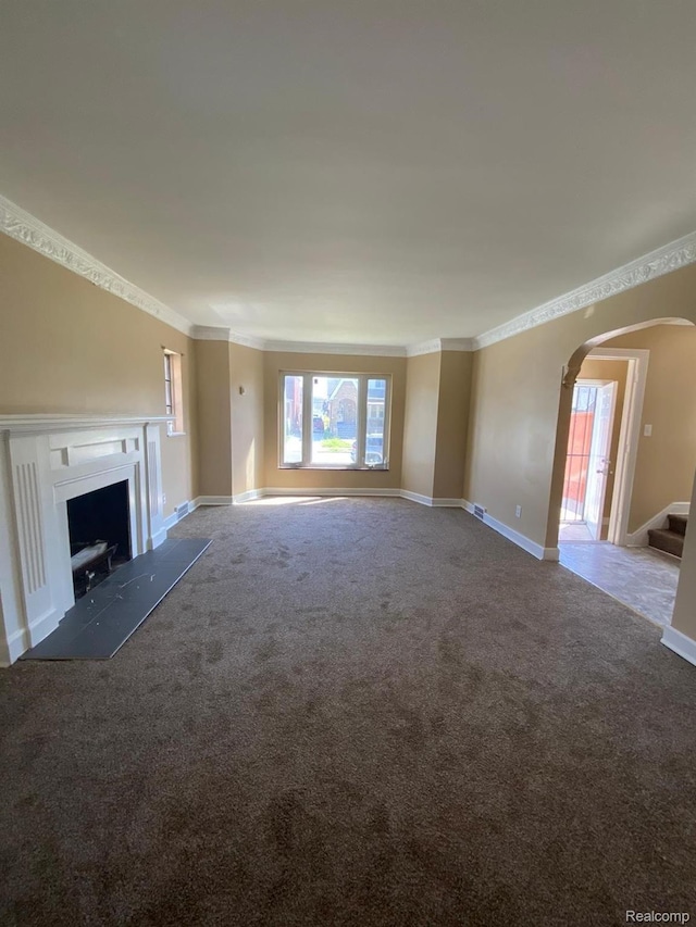 8063 Yolanda St, Detroit, MI 48234 - unfurnished living room with ornamental molding, arched walkways, carpet, a fireplace, and stairway