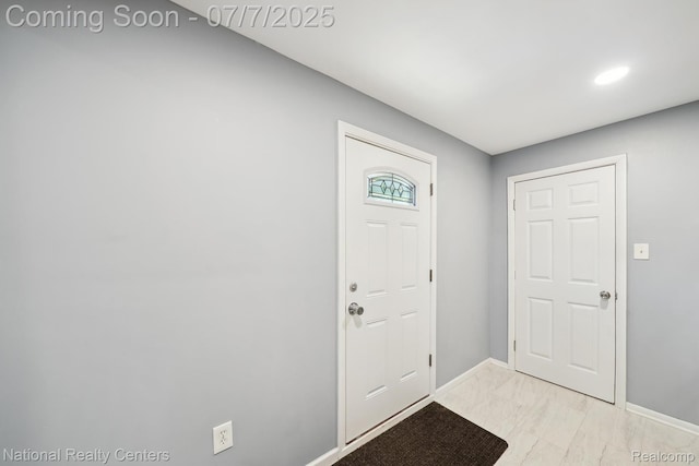 4714 Monterey Ave, Clarkston, MI 48348 - foyer entrance featuring light marble finish floors and recessed lighting