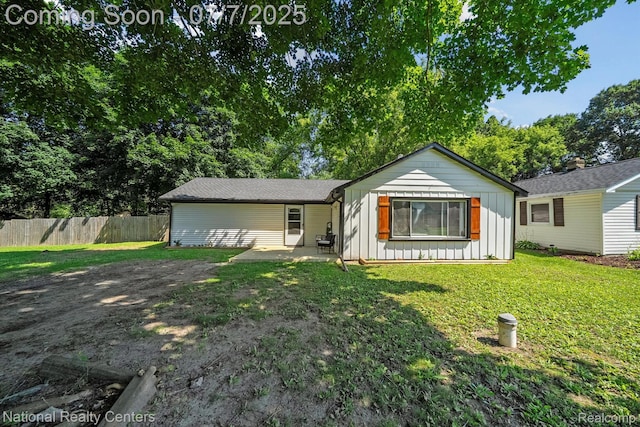 4714 Monterey Ave, Clarkston, MI 48348 - view of front of property with board and batten siding and a patio