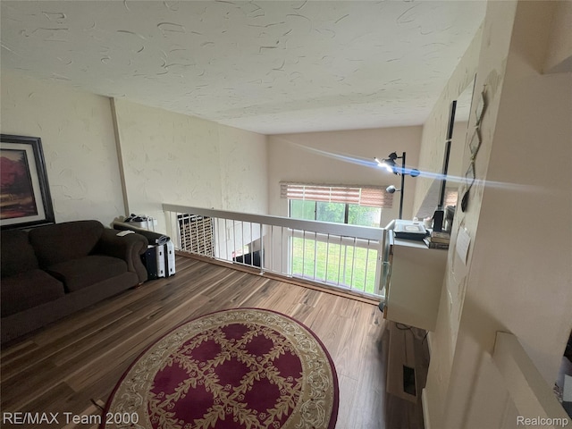 29203 Lake Park Dr, Farmington Hills, MI 48331 - hall featuring wood finished floors, a textured ceiling, and vaulted ceiling