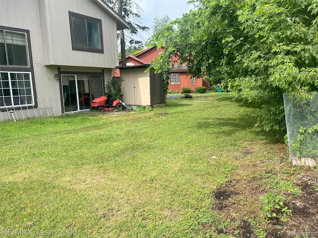29203 Lake Park Dr, Farmington Hills, MI 48331 - view of green lawn featuring a shed