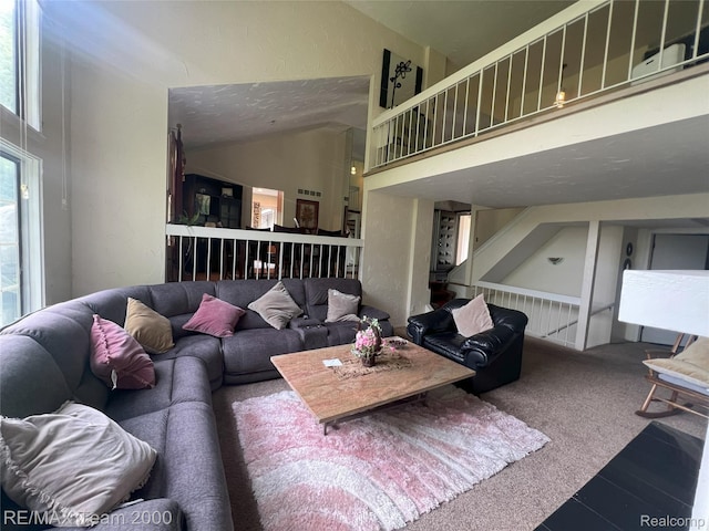 29203 Lake Park Dr, Farmington Hills, MI 48331 - living room featuring high vaulted ceiling and stairway