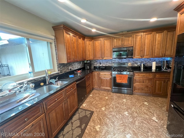 29203 Lake Park Dr, Farmington Hills, MI 48331 - kitchen with appliances with stainless steel finishes, backsplash, brown cabinets, dark stone countertops, and recessed lighting