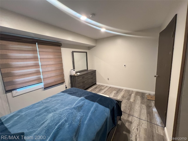 29203 Lake Park Dr, Farmington Hills, MI 48331 - bedroom featuring wood finished floors and baseboards