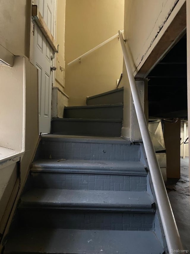 15355 Ward St, Detroit, MI 48227 - stairway featuring unfinished concrete flooring