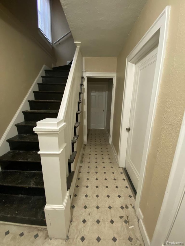 15355 Ward St, Detroit, MI 48227 - staircase with tile patterned floors and baseboards