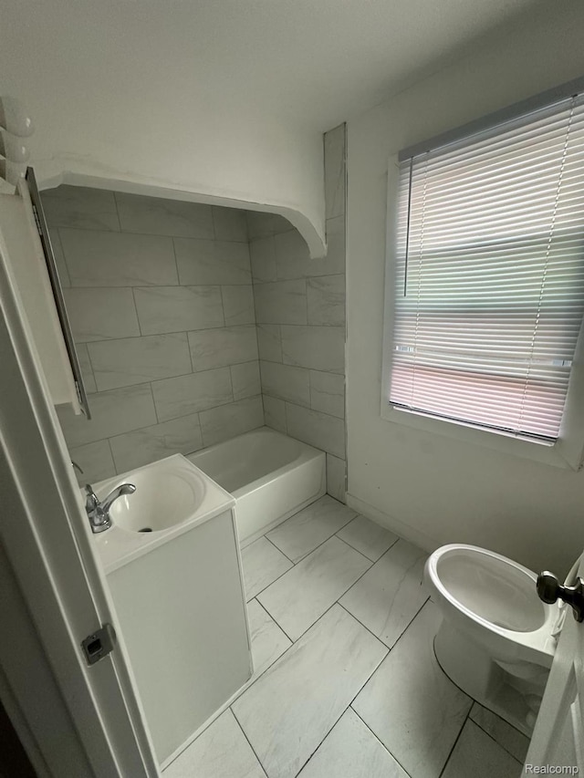 5030 Hereford St, Detroit, MI 48224 - full bathroom featuring marble finish floors, vanity, and a tub to relax in