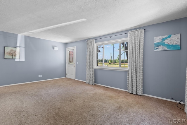4100 Hunt Rd, Adrian, MI 49221 - unfurnished room featuring carpet and a textured ceiling