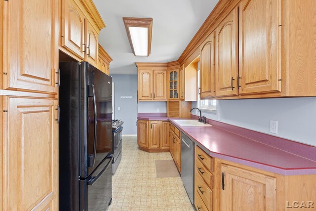 4100 Hunt Rd, Adrian, MI 49221 - kitchen with freestanding refrigerator, light floors, range, dishwasher, and glass insert cabinets
