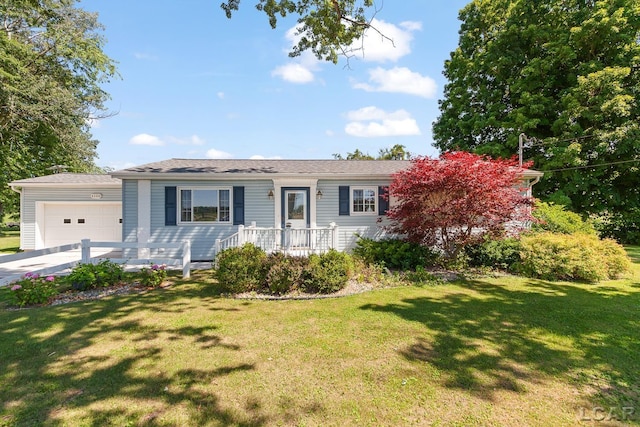 4100 Hunt Rd, Adrian, MI 49221 - ranch-style home featuring a garage, a front yard, and driveway