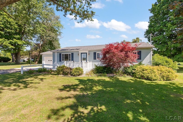 4100 Hunt Rd, Adrian, MI 49221 - single story home featuring a garage, a front lawn, and driveway