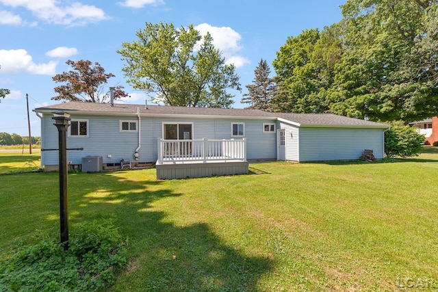 4100 Hunt Rd, Adrian, MI 49221 - back of house featuring a deck and a lawn