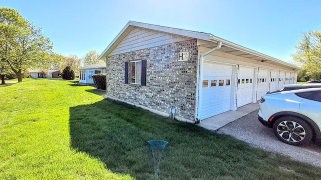 4763 Weston Ave, Kalamazoo, MI 49006 - view of side of property with community garages and a yard