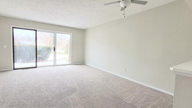 4763 Weston Ave, Kalamazoo, MI 49006 - spare room with light carpet, ceiling fan, and a textured ceiling