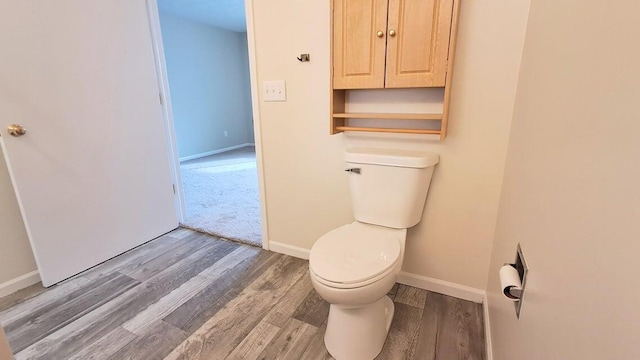 4763 Weston Ave, Kalamazoo, MI 49006 - bathroom with toilet and wood finished floors
